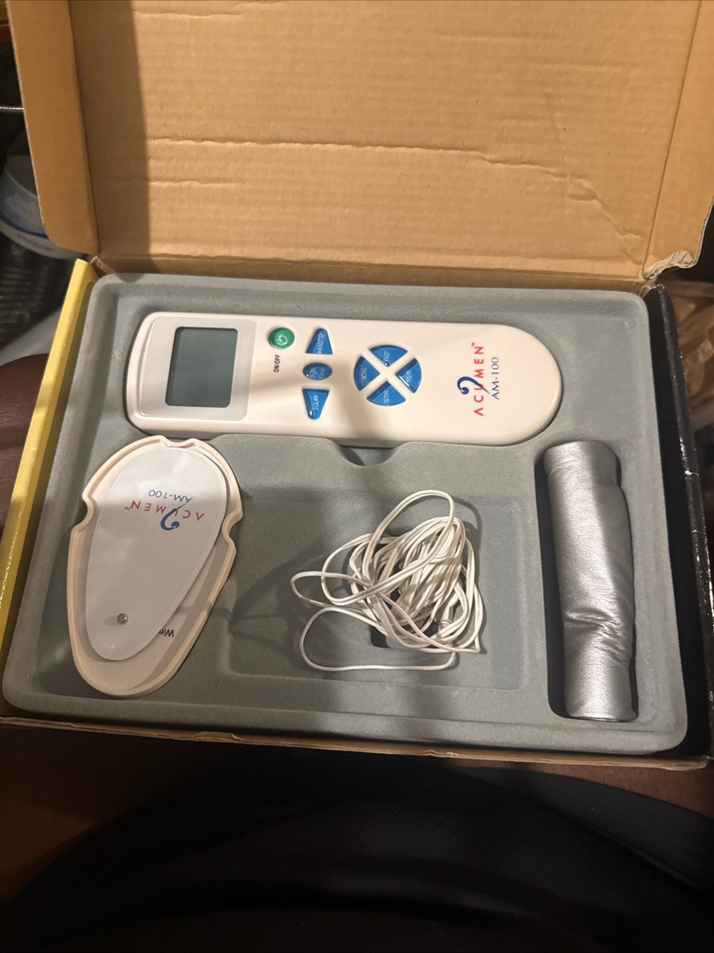 AM-100 White TENS Unit with Electrode Pads